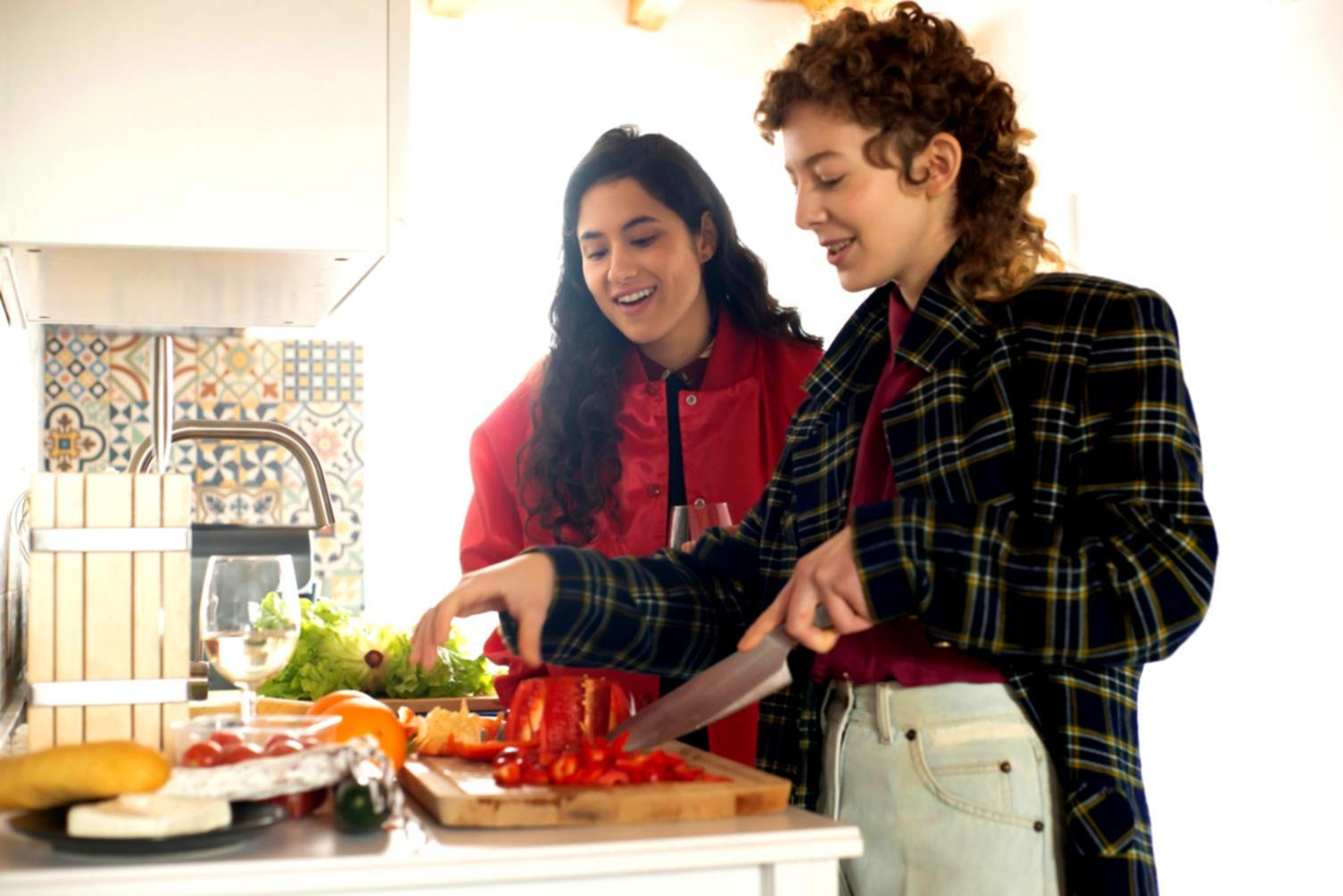 Professional culinary workspace with fresh ingredients and cooking tools